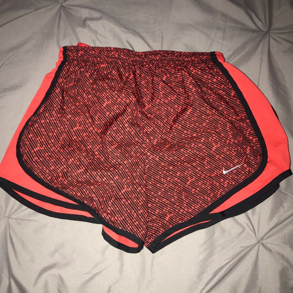 Red and black Nike shorts